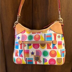 Dooney & Bourke art deco shoulder bag with red interior- never used